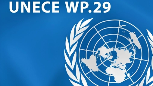 Blue emblem featuring a world map inside a wreath alongside bold white regulatory code text overlaid